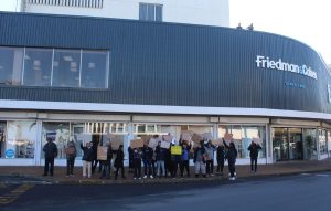 Wage rift at Strand’s Friedman & Cohen