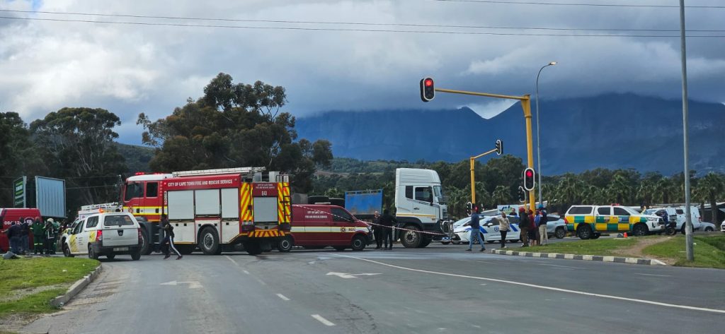 View from Broadlands Road showing emergency services attending truck collision scene