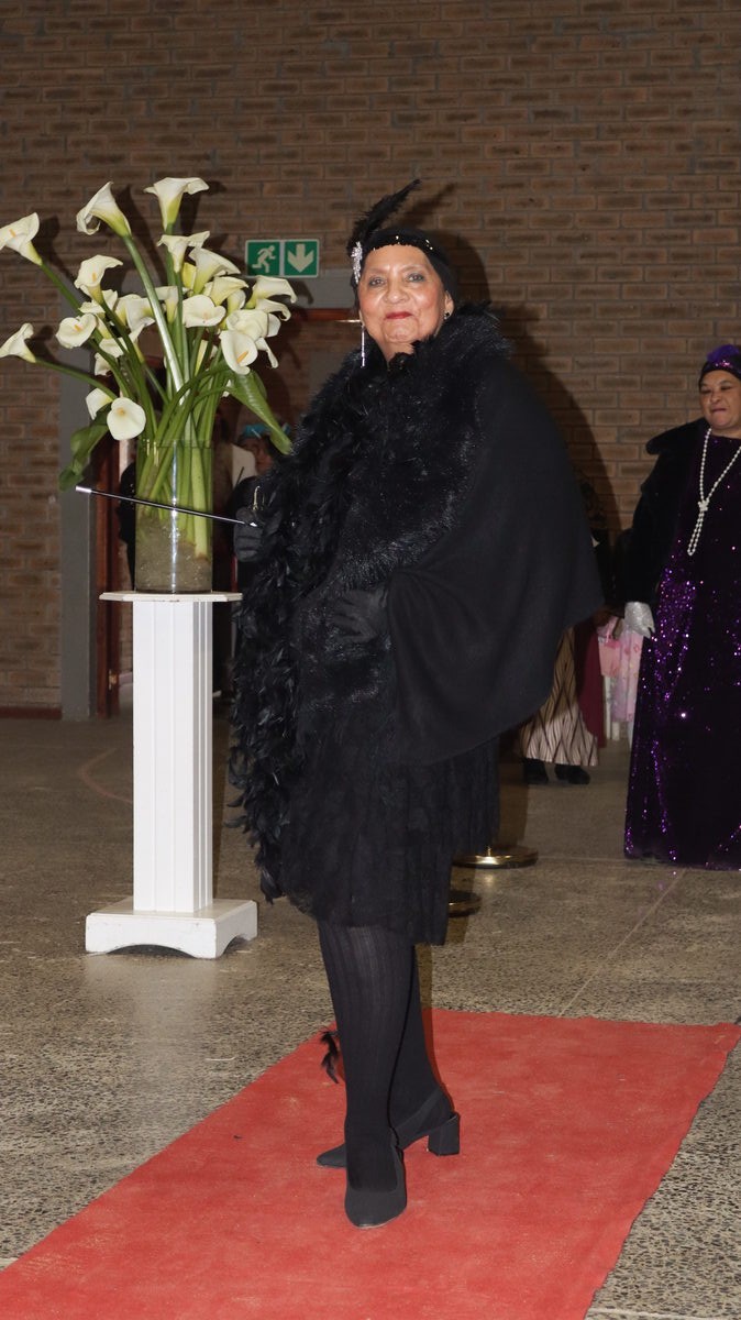 Yasmin Arnolds channels Josephine Baker in vintage flapper-era costume.