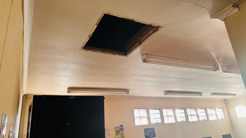 The perpetrators gained access through the ceiling to bypass the alarm and ripped out electrical wires.