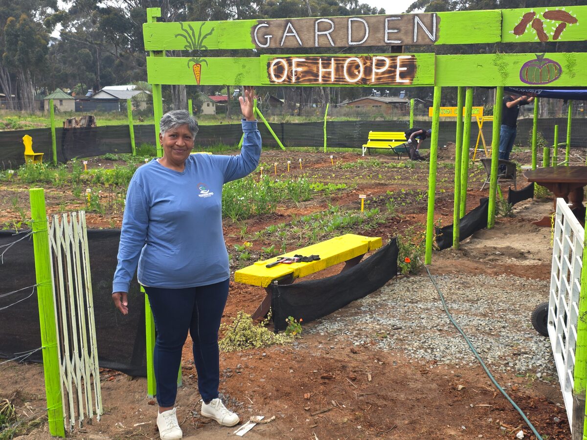 Heather Daniels, operations manager, standing in Garden of Hope at Helderberg Omgee facility