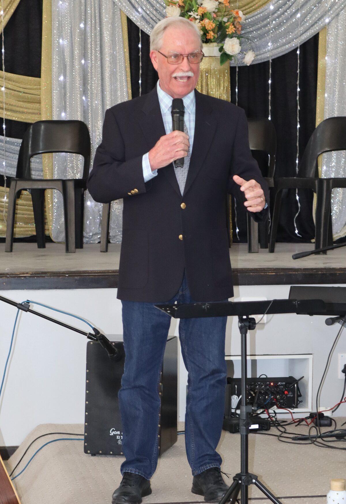 Bruce Jackman delivering speech about late founder Barbara Tofaute at Hope and Light anniversary service