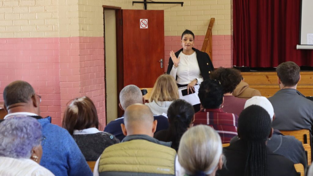 Tenielle Martin, Eskom's key customer relations manager, addresses residents at the Raithby Methodist Church hall on Thursday 18 September during the Eskom community engagement with Raithby and surrounding areas. Photo: Barend Williams