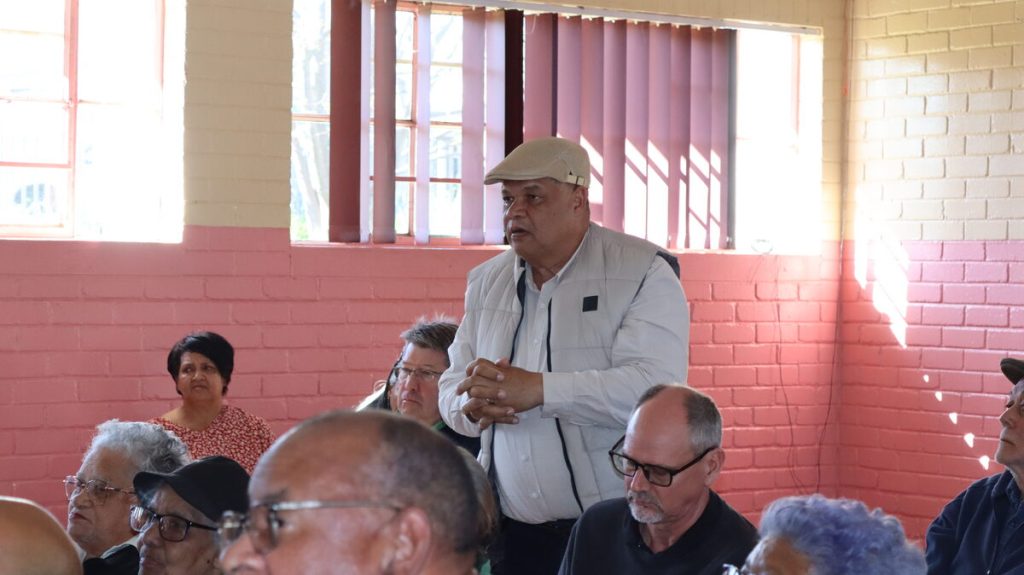 Alven Driver questions municipal officials about community engagement during the session. Photo: Barend Williams