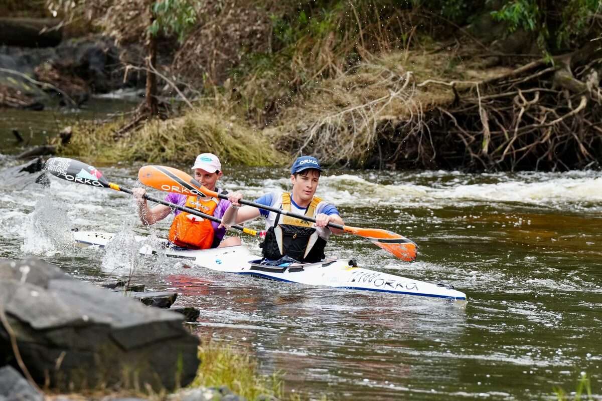 Strand paddler Kira Bester (back) and her partner Dyllan Farrell.
