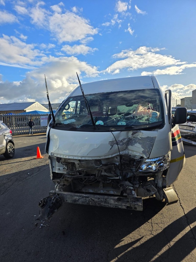Damaged crèche transport taxi after collision with two vehicles on Broadlands Road