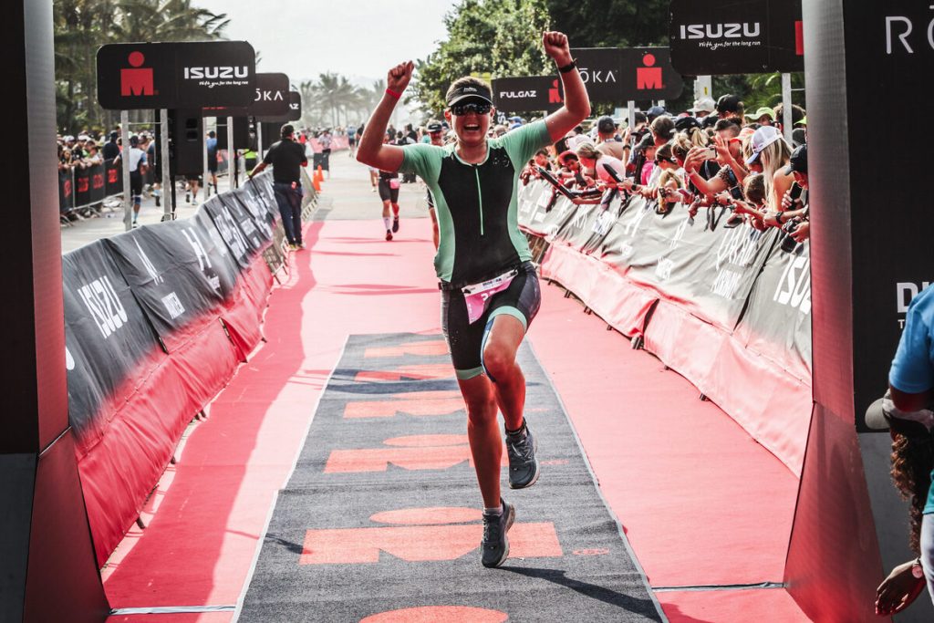 Carla Annas crosses the finish line at the Durban Ironman 70.3 race.