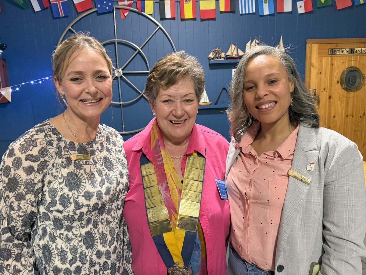 District governor Pam Rawbone (centre) with Paul Harris Fellows Deidre Petersen (left) and Lanese Hesselman (right).