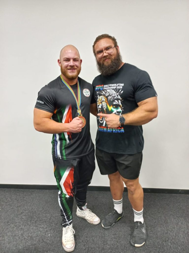 Dante Driessen (left) pictured with Nicholaas du Preez, world champion powerlifter.