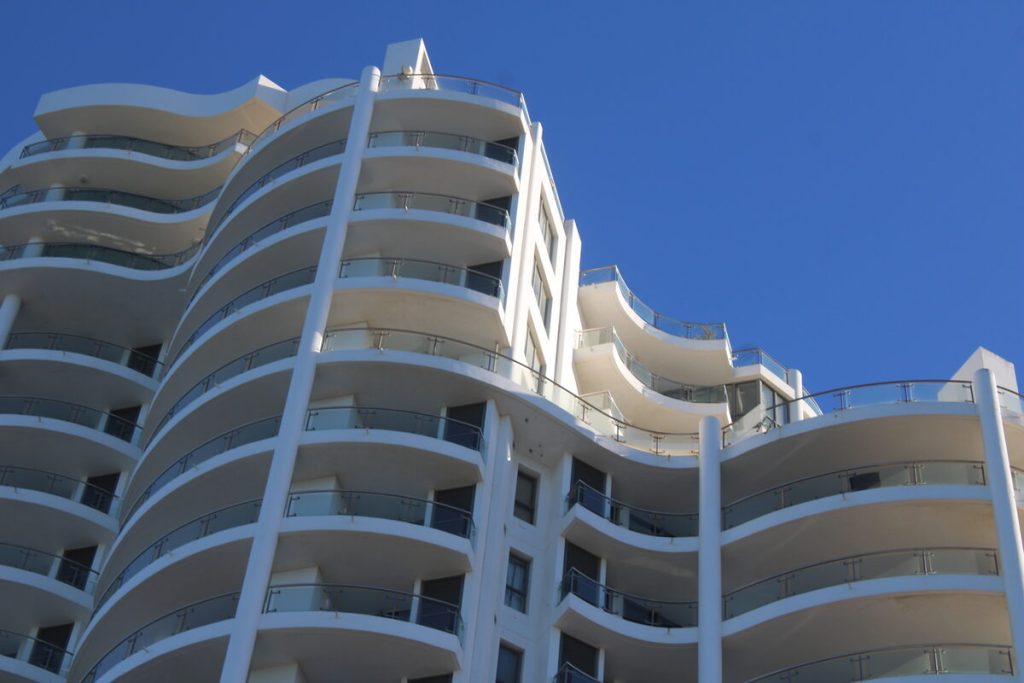 Glass panels from an upper balcony (top right) fell to the ground.
