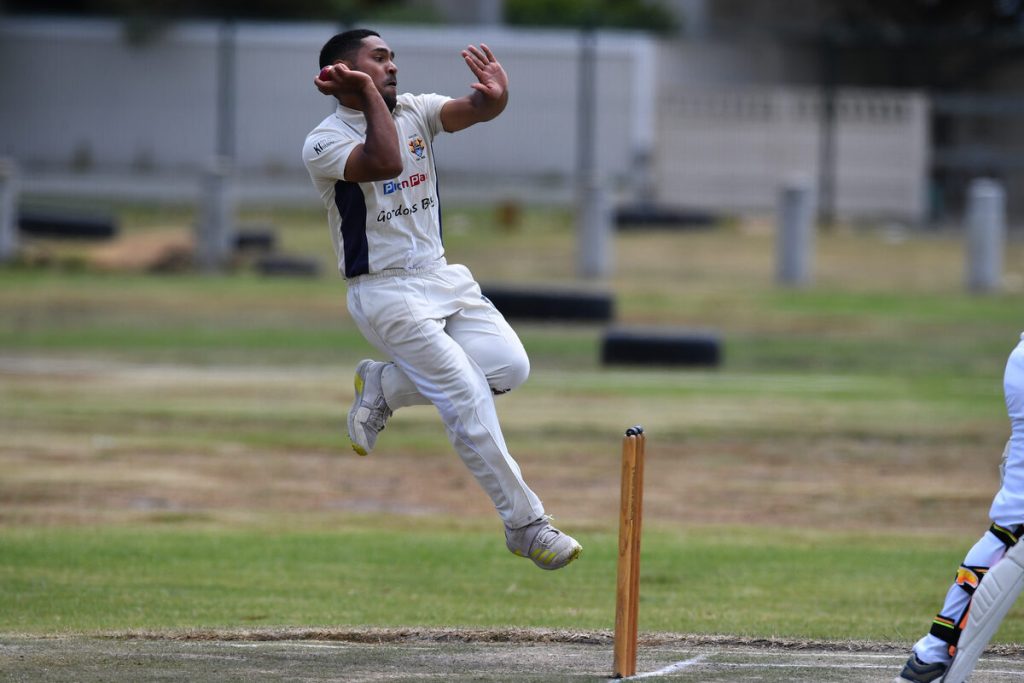 Yaaseen Smith of HHCC comes storming in with a fast delivery against Cravenby CC. He was one of the team's star performers with the ball. Photos: Peter Bee
