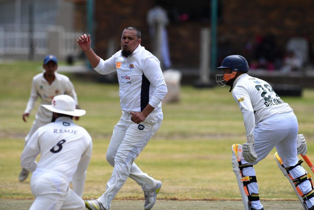 Bowler for HHCC Yusri Jabodien (centre) watches on in a close call.