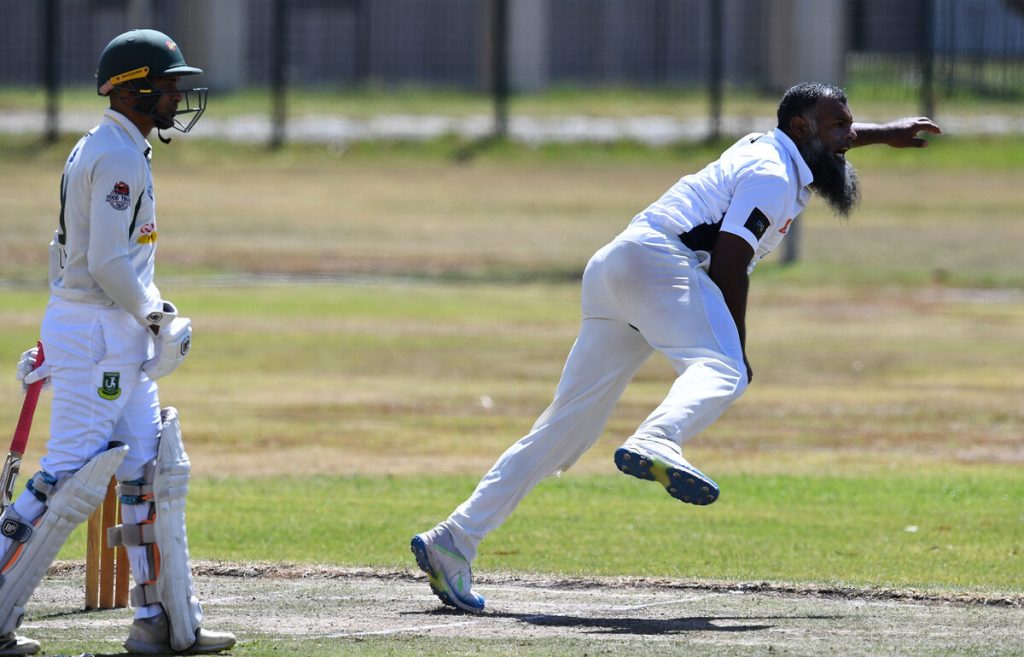 Veteran HHCC player Abdul Aziz Temoor in full flight after a delivery.