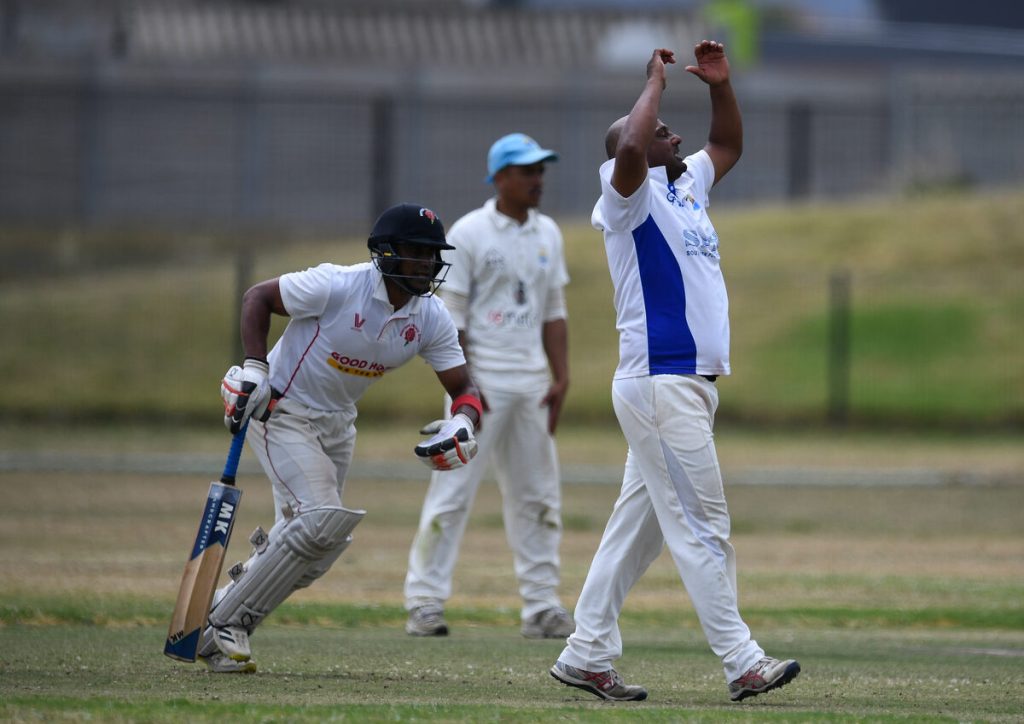 Ebrahiem Latief (right) bowling for Strand CC showing off a bit of frustration.