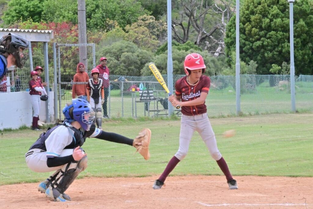 Helderberg Pirates catcher Cameron Leah in action against Kuils River Cardinals.