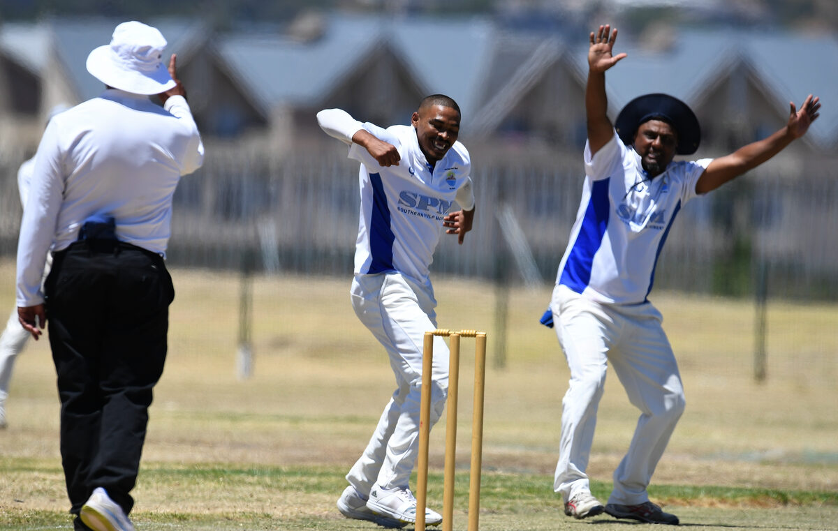 Ebrahim Latief and Sharwaan Naidoo of Strand CC celebrate the umpire lifting the dreaded finger in their match against Khayelitsha CC at Gustrouw Sports Ground on Saturday. Photo: Peter Bee