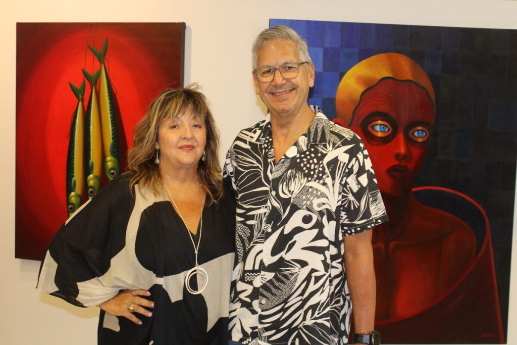Michele Sinclair of Ndiza Gallery with artist Andy Louw at the launch of the First Brush exhibition. 
