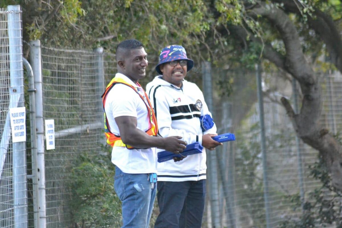 Sgt Jeremiah Naidoo and Marlon Solomons sharing a farewell moment during campaign event