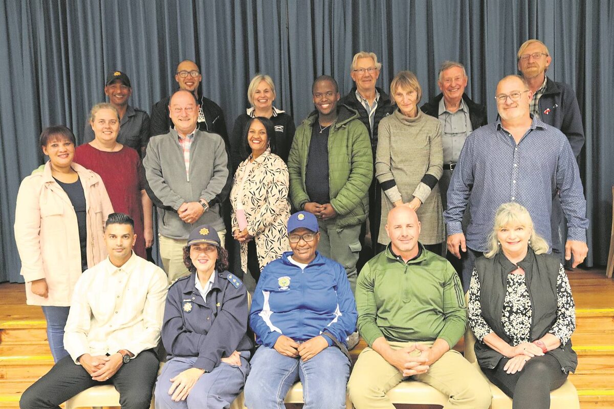 Somerset West Community Policing Forum executive team photo with former chairperson Dane Thomas front left
