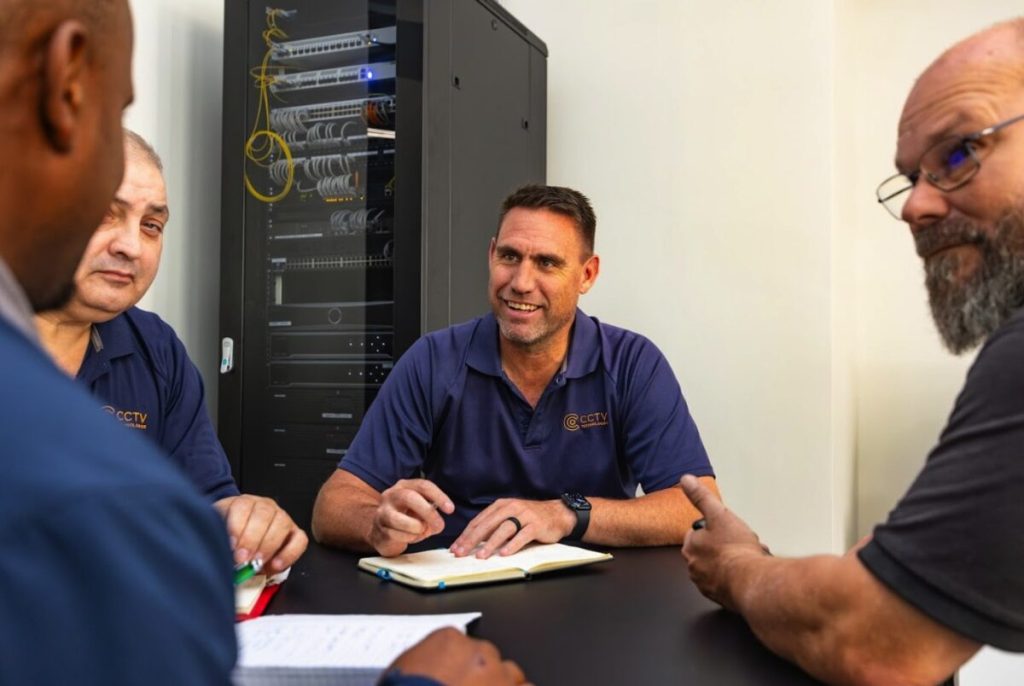 Marius Bezuidenhout (middle) with colleagues at Fair Cape Solutions CCTV Technologies office