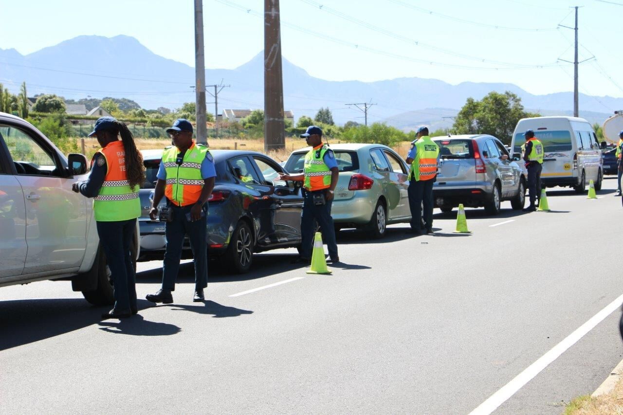 Traffic officers conduct high-visibility roadblocks during intensified Easter safety operations.