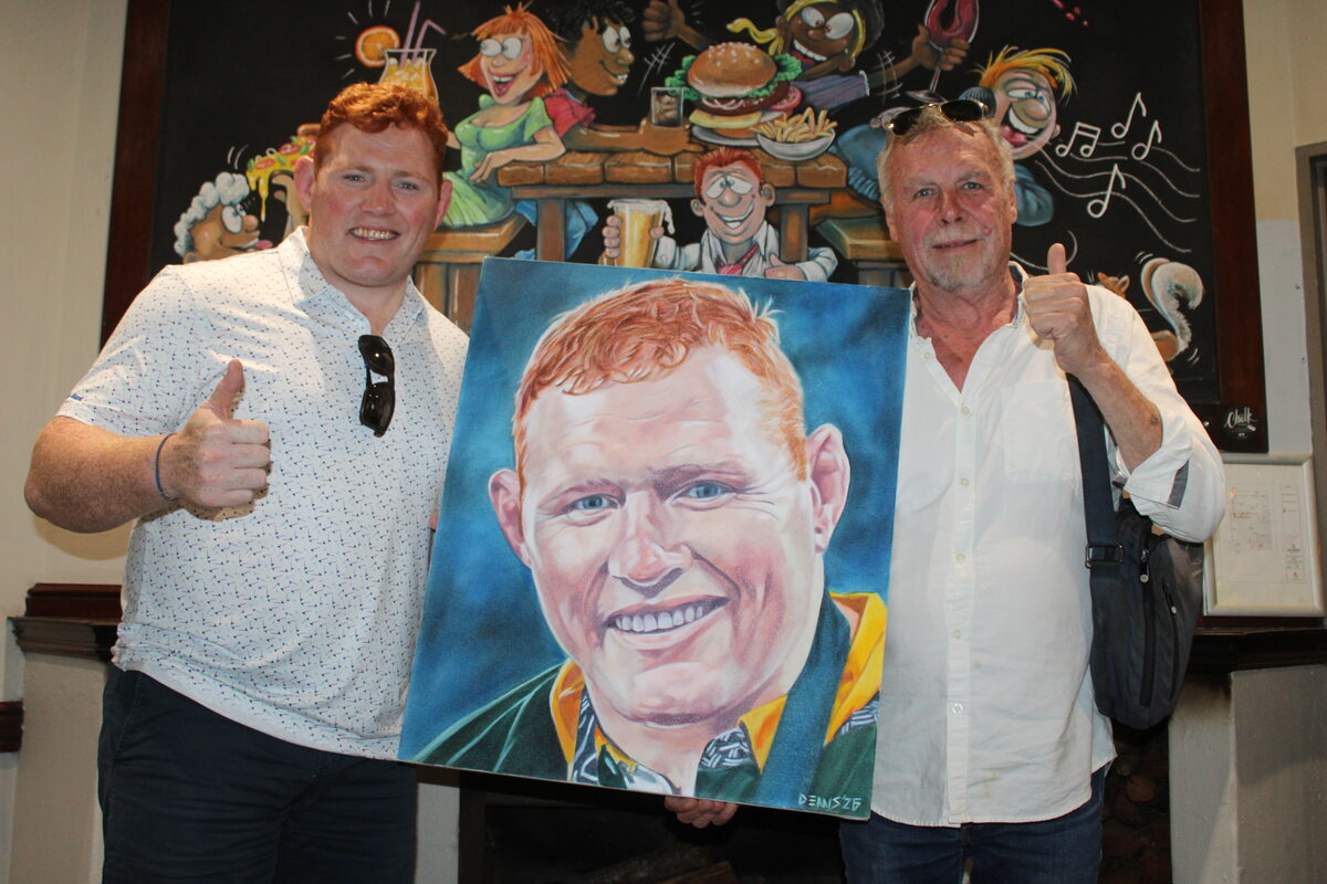 Double Rugby World Cup winning Springbok Steven Kitshoff pictured with Somerset West artist Dennis Woest at The Old Bridge Tavern. Photo: Jamey Gordon