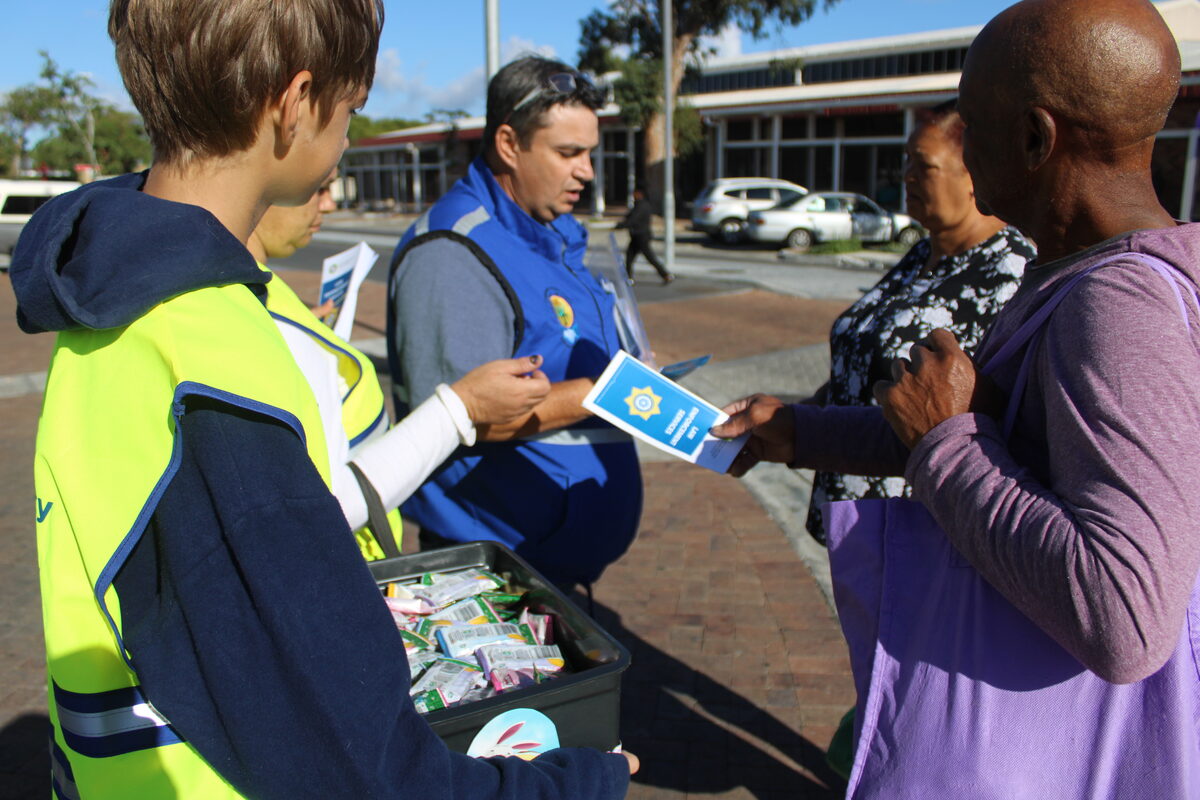 George Kruger, Somerset West Community In Blue coordinator, engaging community members during the Easter Awareness Drive.