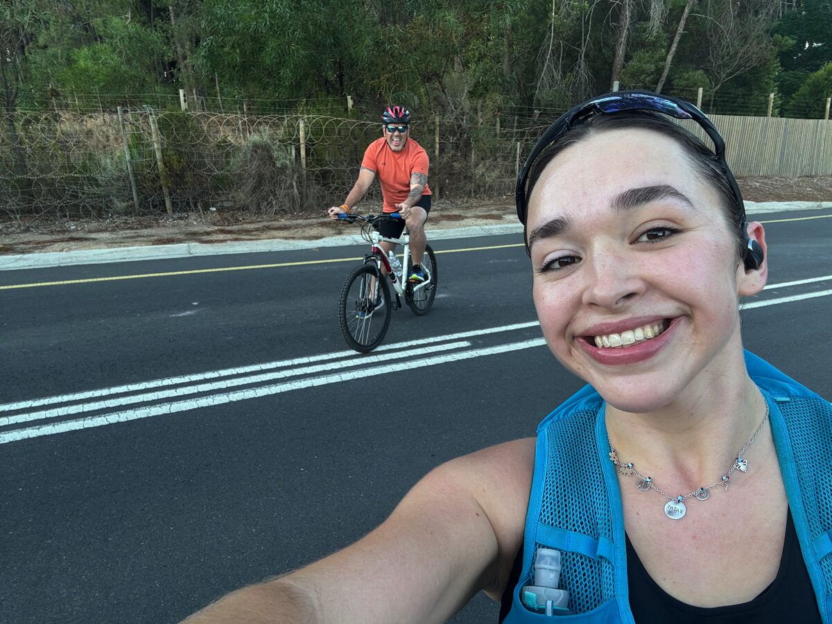 Raine Scott Anderson's father Alan cycles alongside her during London Marathon training runs.