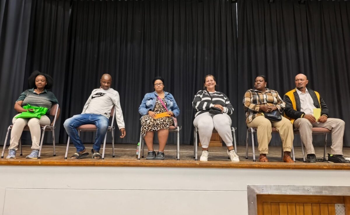 Group of six newly elected committee representatives for housing development project