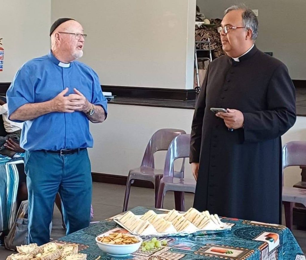 Rev Dcn Lester May and Fr Brandon West, who served together at St Peter's Strand and St Monica's Lwandle.