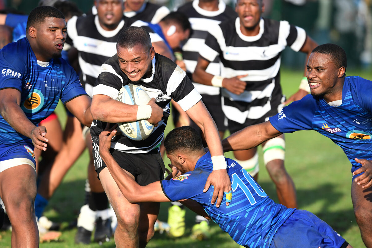 All Saints' Junaid Sylvester charges forward against CPUT at Helderzicht Sports Ground on 23 May.