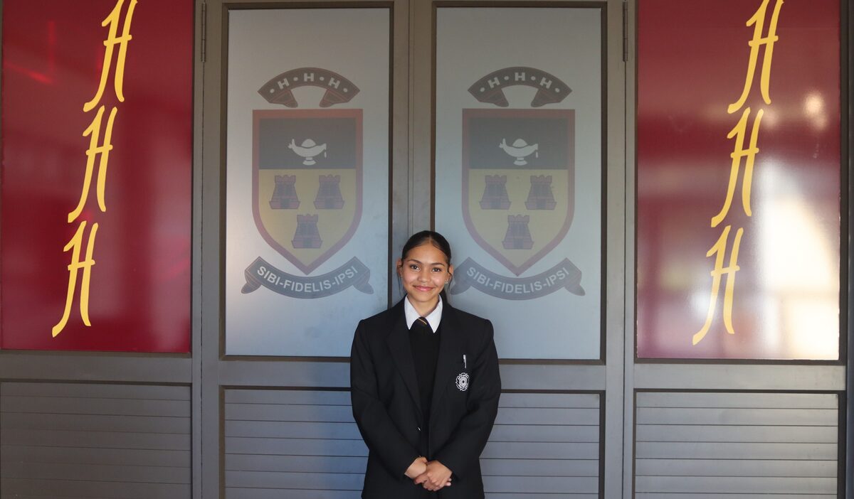 Wintonia Jacobs smiles at Hottentots-Holland High School, the place she finally calls home