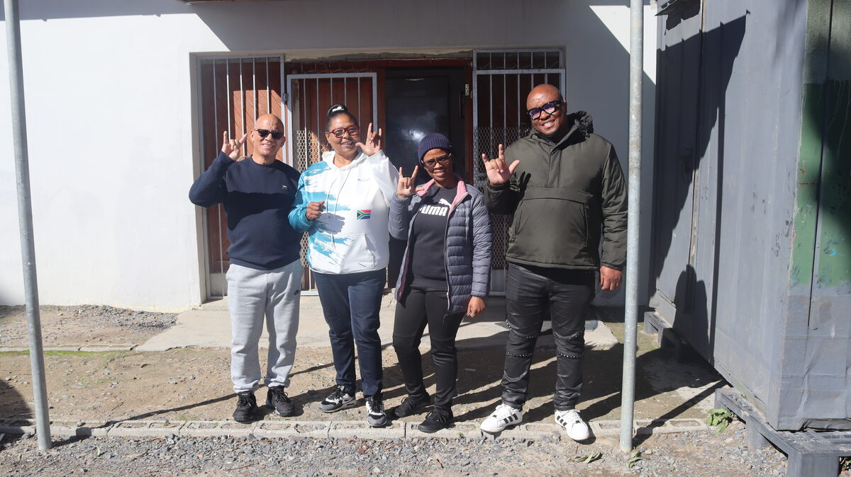 Jacob van der Merwe, Gertruida Hendricks, Anneke Manuel and Bra Eddie Tsubella pose together in Strand.
