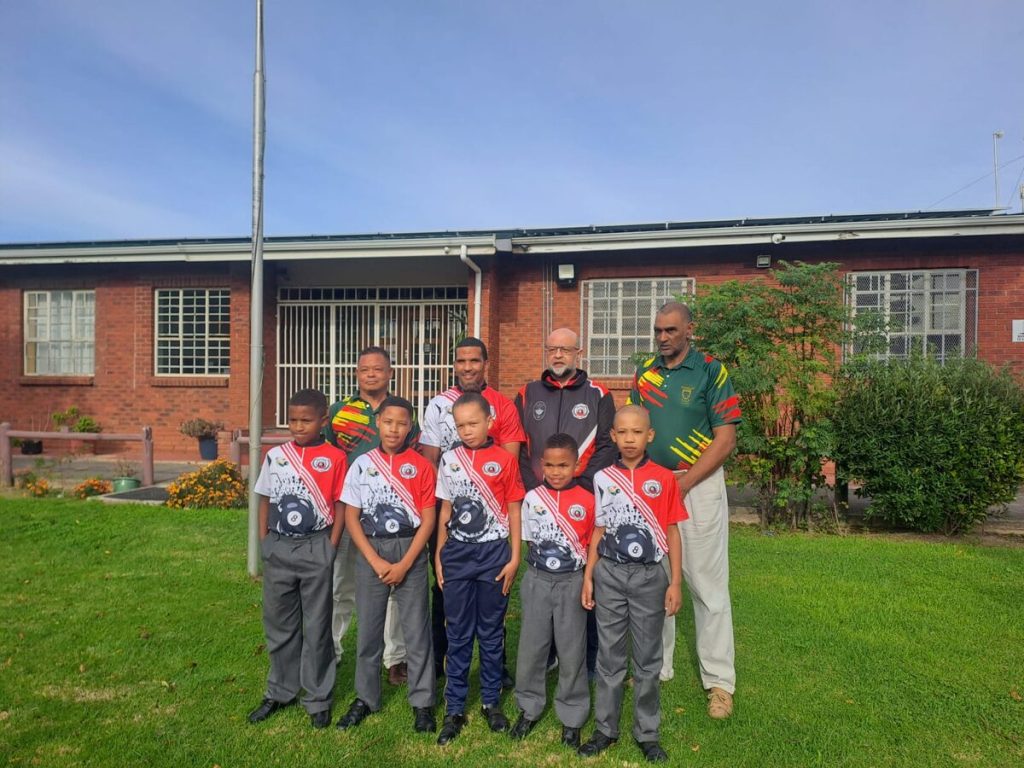 The HPU under-14A players who will compete at nationals (front row from left) are Glestehano Fortuin (Macassar Primary), Christiano Niewenhuys (Oklahoma Street Primary), Jane Brown (False Bay Primary), Junior Fortuin (Macassar Primary) and Caleb Jansen (Oklahoma Street Primary). Behind: Noel Franks (South African Pool Referees' Association – SAPRA), Gladstone Baadtjies (manager), Adiel Rhoda (HPU) and Fernando Rudolph (HPU).