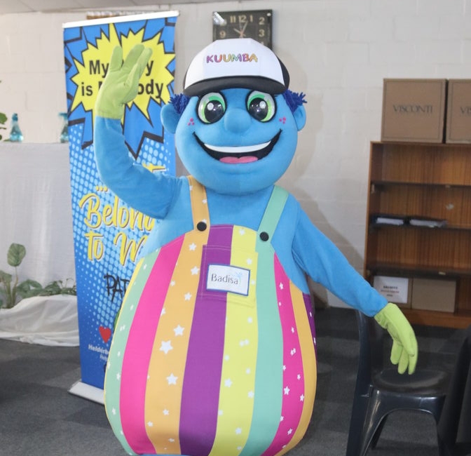 Badisa's mascot Kuumba, hailing from Rainbow Land, delights children at the National Child Protection Week event.