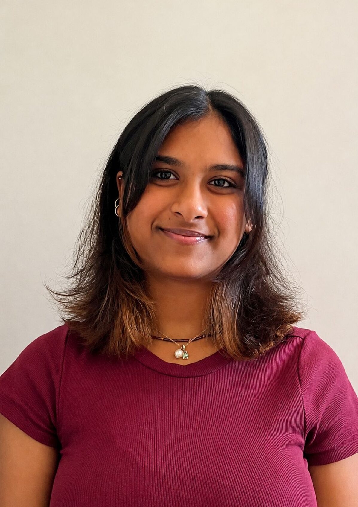 Intern Leevasha Reddy in the DistrictMail & Helderberg Gazette newsroom during her two-week internship.