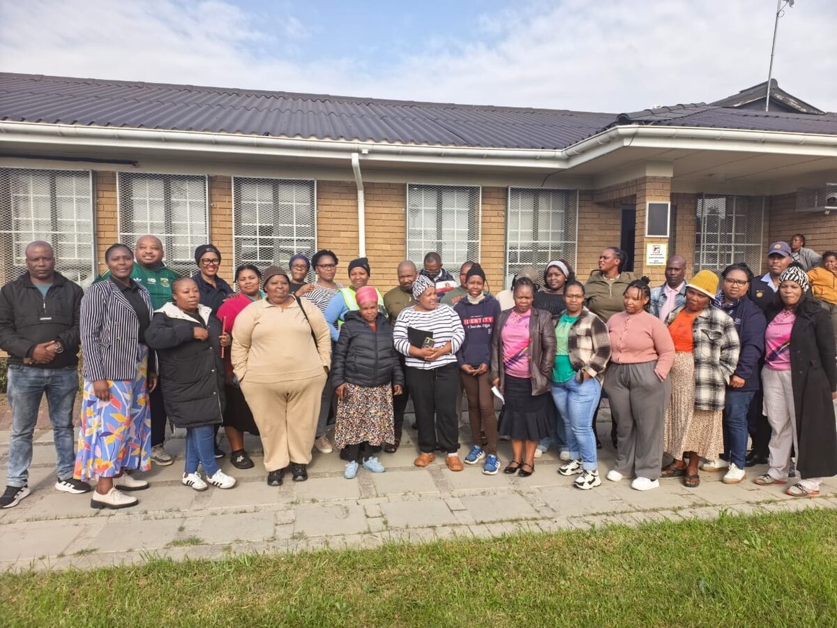 Nine new road safety ambassadors with stakeholders at Lwandle launch event.