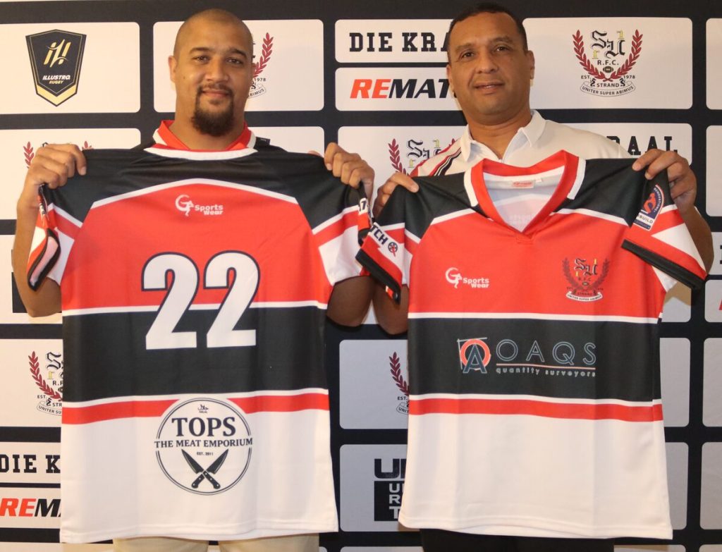 Strand United captain Munier Davids and coach Taariq van der Ross with new jerseys