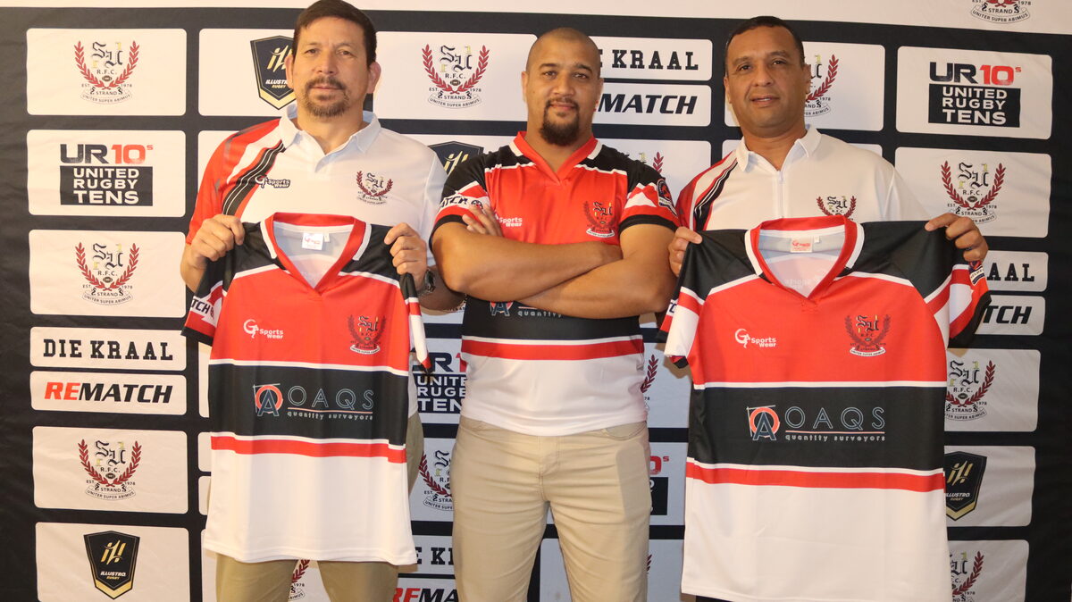 Shamiel Ismail, Munier Davids and Taariq van der Ross with new Strand United jerseys