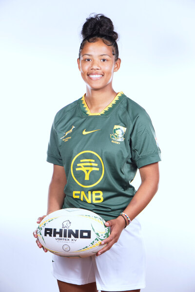 Mia Kanka in die Springbok se groen en goud rugbytrui