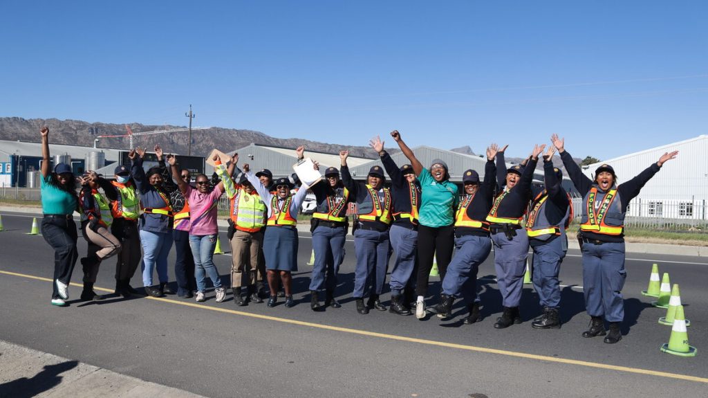 Female officers from Khayelitsha and Metro Police show solidarity at N2 roadblock in Strand for Women's Month