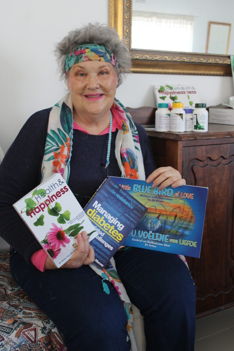 Dr Arien van der Merwe with some of the books she's written.