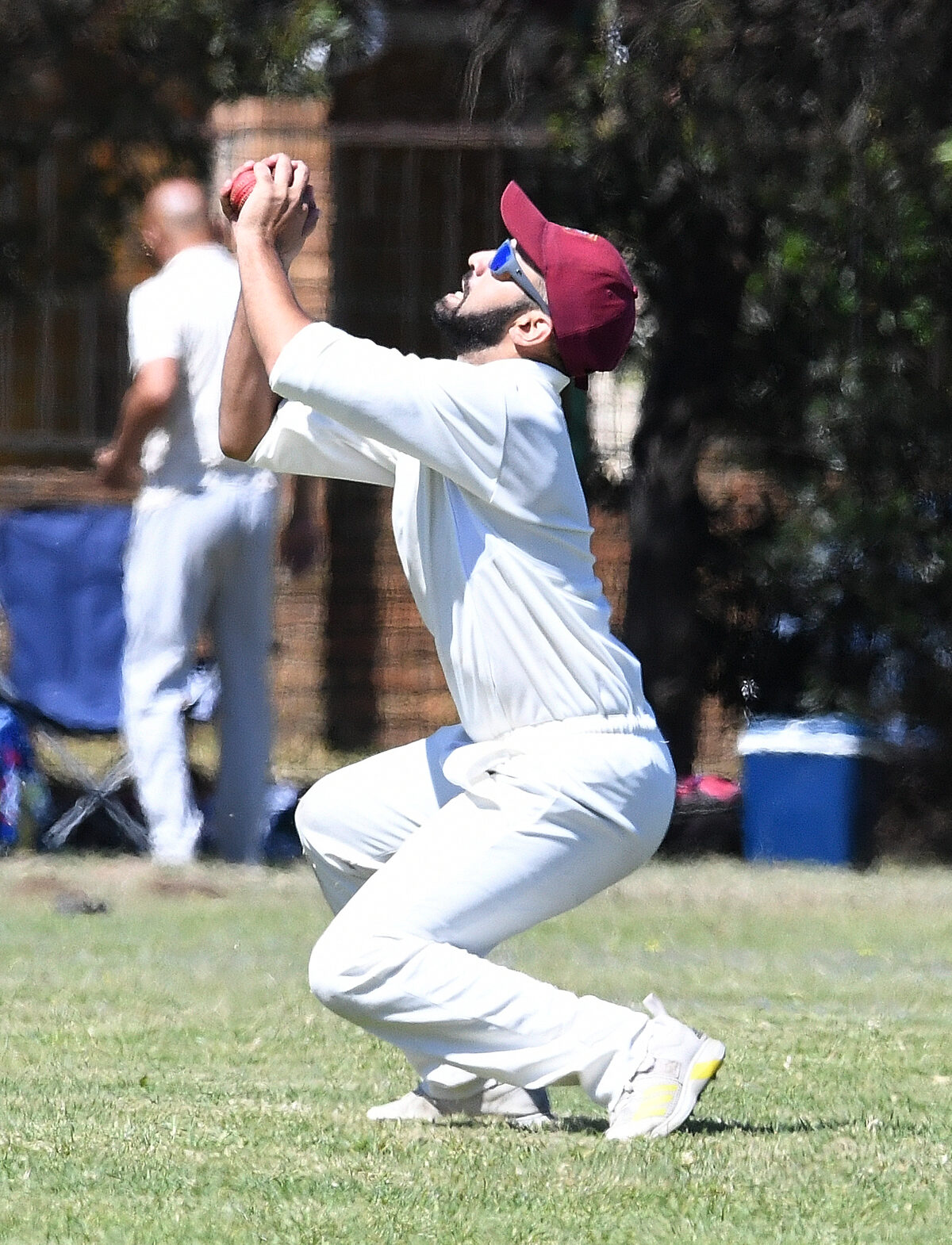 Declan Fredericks playing for Helderberg takes a high ball catch with textbook style.