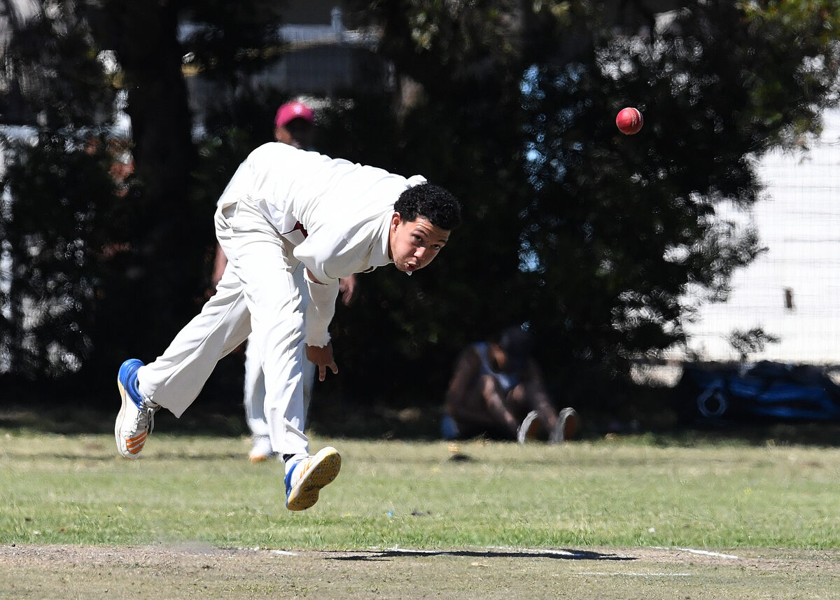 Sharick Swarts keeping his eye on the ball with a fearsome delivery for Helderberg.