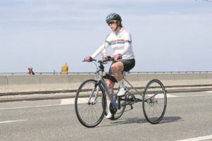 Para-cyclist pedalling to Paris