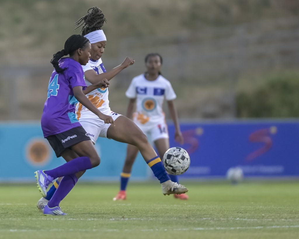 NWU's Nontobeko Gumede and Wits' Primrose Kopeka battle for the ball during their thrilling 2-2 draw in Round 3 action at UJ Soweto Stadium. Photo: Christiaan Kotze/ASEM Engage