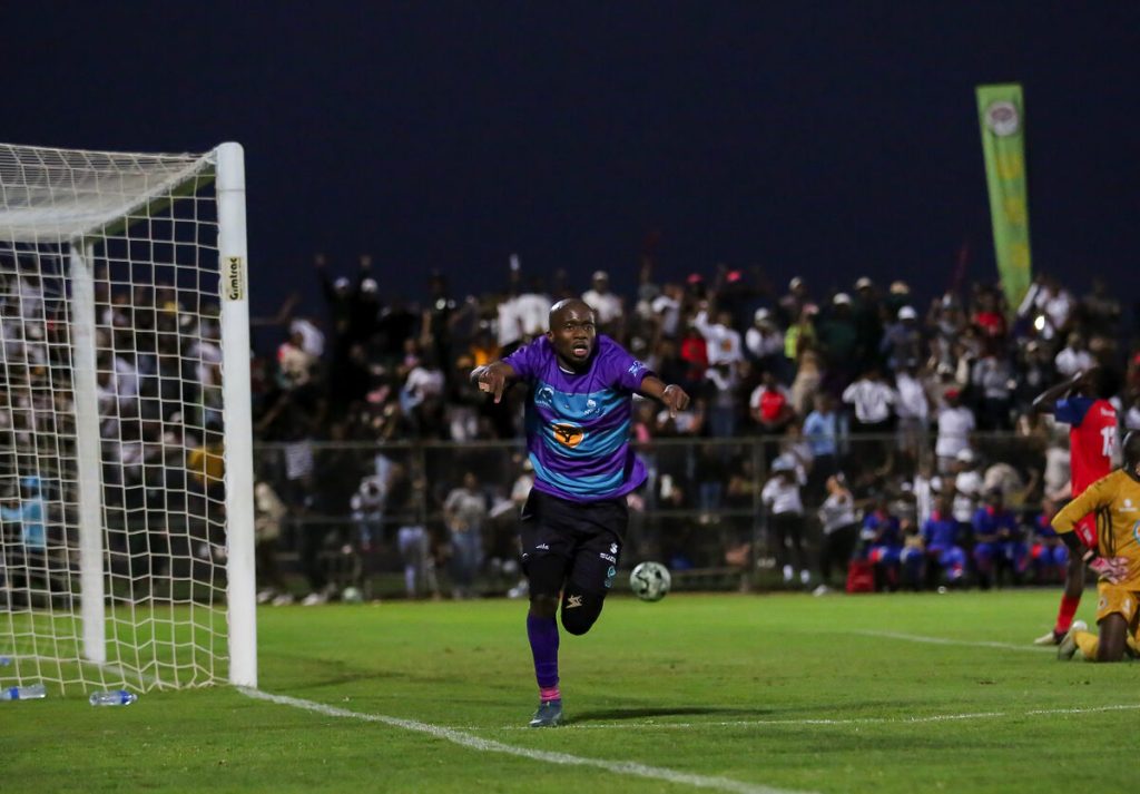 NWU striker Momelezi Mngati celebrates after finding the back of the net in his side's 1-0 victory over TUT at teh NWU Mahikeng Stadium. Photo: Varsity Sports