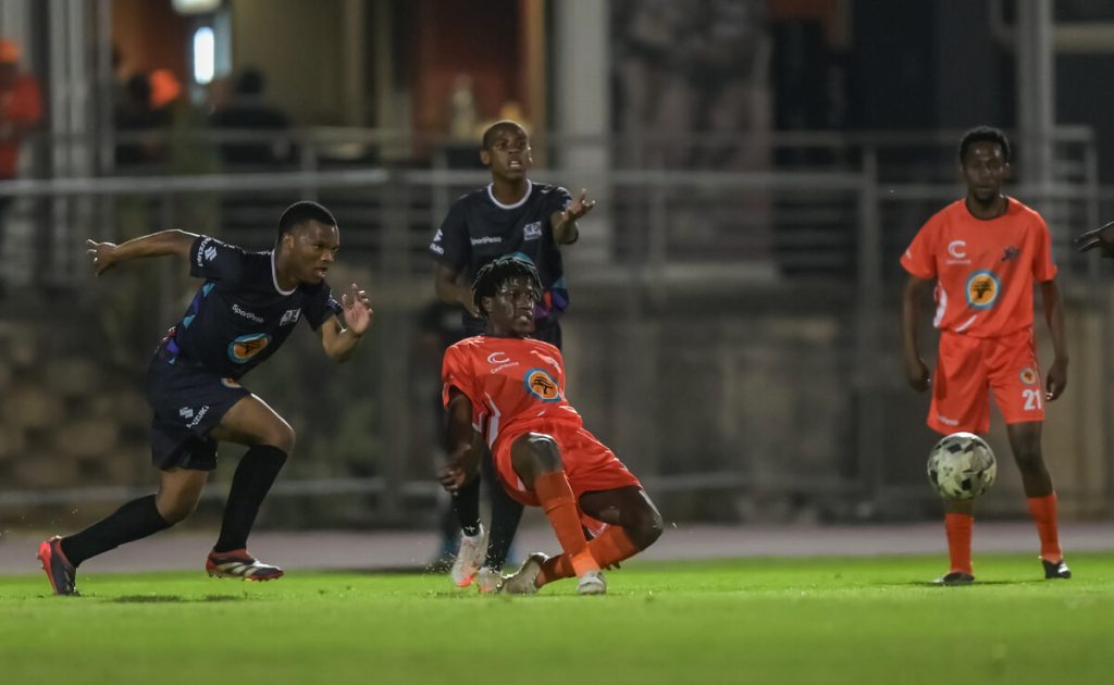 Sinenhlanhla Mkho of UJ passes the ball in the hopes of finding a teammate during his side's 1-1 stalemate with DUT at the UJ Soweto Stadium Photo: Christiaan Kotze/Asem Engage