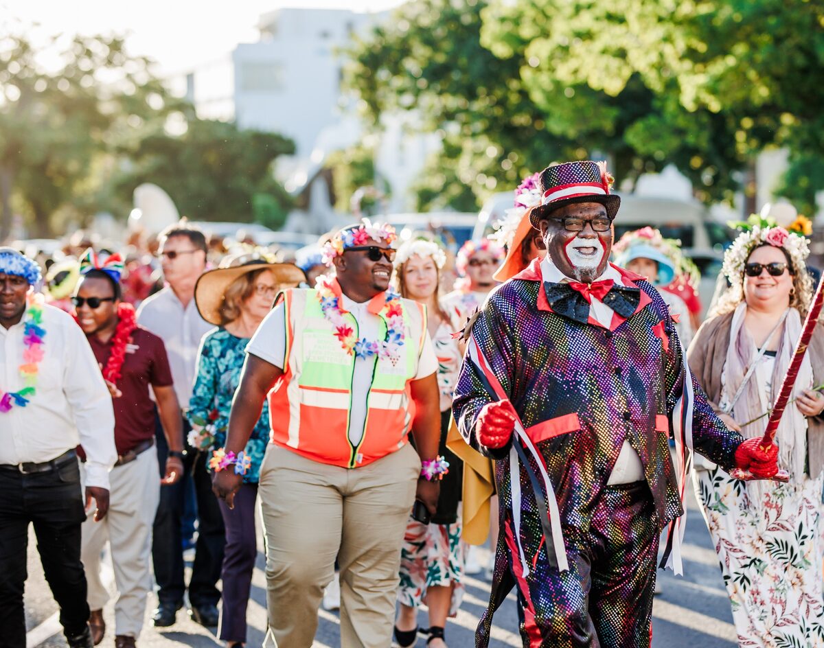 Young and old will pop on their colourful flower crowns a march through town centre for the annual Flower Parade.