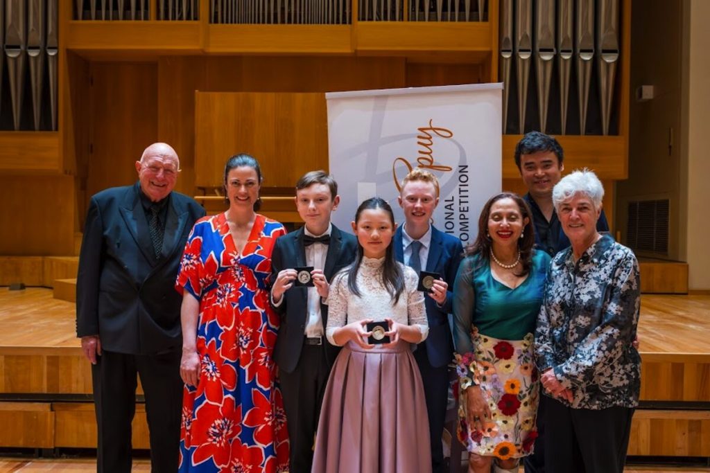 The 36th Hubert van der Spuy National Music Competition, where South Africa's most talented young musicians gathered, was held at Stellenbosch University's world-class Endler Hall from Tuesday 30 September to Saturday 4 October. This prestigious competition, founded in 1989 by Professor Hubert van der Spuy, has grown into the nation's premier platform for musicians aged 13 and under. After an intense week of competition, three exceptional young artists emerged victorious from a field of 43 competitors representing South Africa and Namibia. Twelve-year-old pianist Agnes Huang from Johannesburg took home the gold medal and an impressive R39 700 in total prizes. Silver medalist Victor Le Du, a 13-year-old pianist from Makanda (Grahamstown) and bronze medal winner Henning Bouwer, a 13-year-old flautist from Johannesburg, completed the winning trio. For over three decades, this competition has celebrated young musical talent, offering dreams, discipline, and over R100 000 in prizes to nurture SA's future musical stars. With the winning trio (from left) are Prof Hubert van der Spuy, Dr Esthea Kruger, Victor Le Du (second), Agnes Huang (winner), Henning Bouwer (third), Dr Marlene le Roux, Junnan Sun and Denise Sutton.